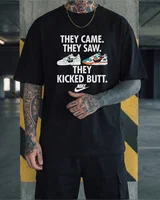 Nike Футболка Nike kicked butt чорна — головне фото товару