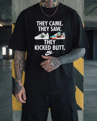 Nike Футболка Nike kicked butt чорна — головне фото товару
