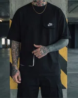 Nike Футболка Nike чорна — головне фото товару