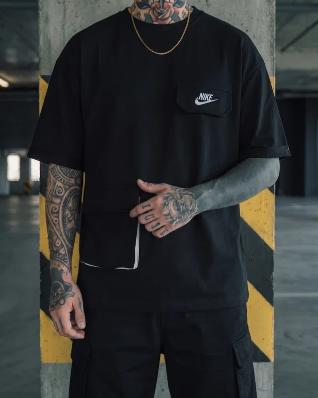 Nike Футболка Nike чорна — головне фото товару
