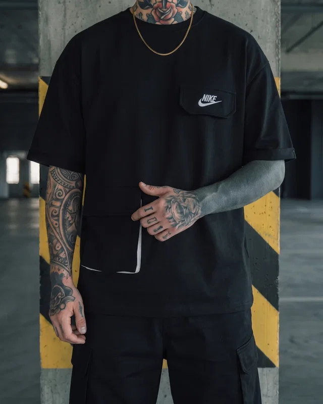 Nike Футболка Nike чорна — головне фото товару