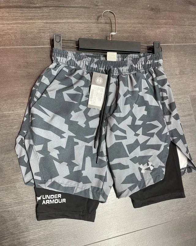 Under Armour Шорти Under Armour піксесь — головне фото товару