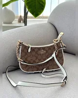 COACH Coach Teri Shoulder Bag In Signature Canvas Snake/Brown [крафтова брендована коробка] 24 х 14 х 6,5 COACH — головне фото товару